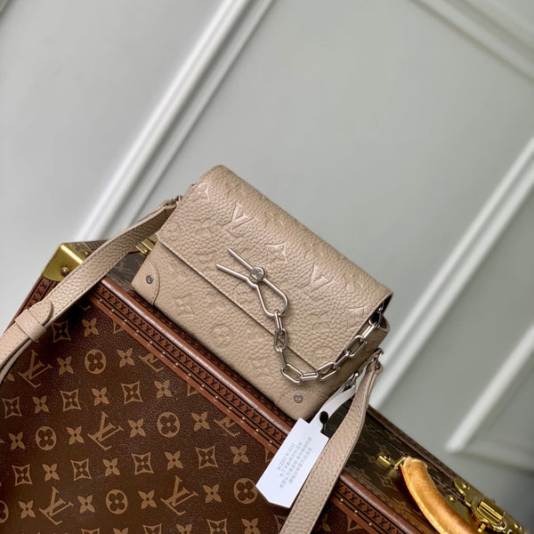 STEAMER WEARABLE WALLET 18 IN LIGHT BROWN MONOGRAM TAURILLON CALFSKIN