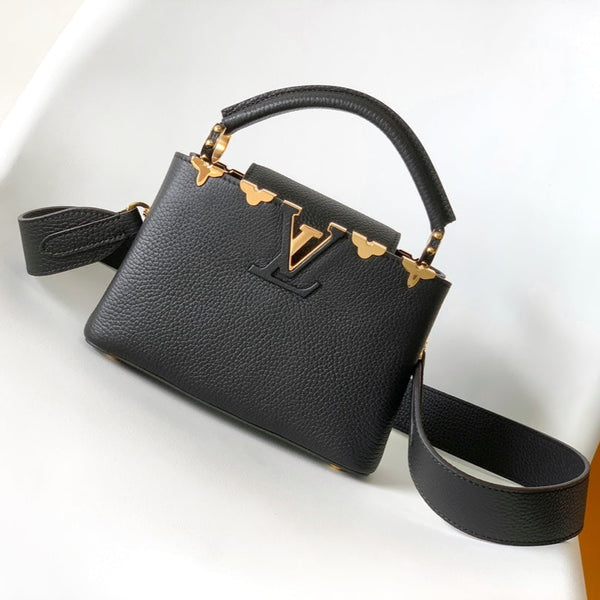 CAPUCINES MM BAG 21 IN BLACK TAURILLON COWHIDE GOLD HARDWARE